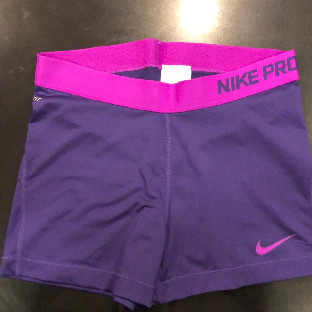 Purple Nike spandex shorts